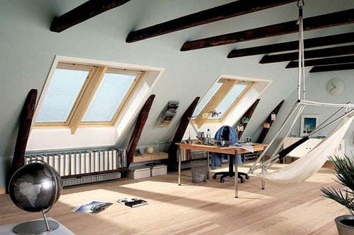 RoofLITE windows with pine finish located in loft space with blinds